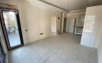 Apartment with an area of 60 m² in a new premium residence in Oba, Alanya.-id-2268-photo-2
