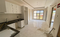 Apartment with an area of 60 m² in a new premium residence in Oba, Alanya.-id-2268-photo-3