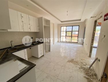 Apartment with an area of 60 m² in a new premium residence in Oba, Alanya.-id-2268-photo-3
