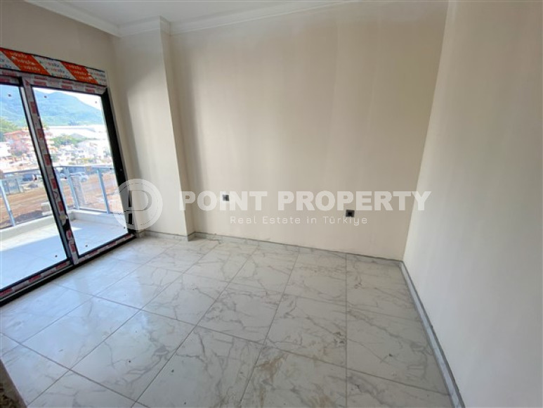 Apartment with an area of 60 m² in a new premium residence in Oba, Alanya.-id-2268-photo-9