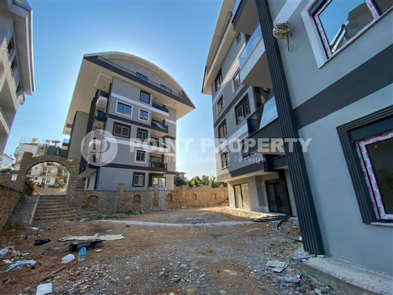Apartment with an area of 60 m² in a new premium residence in Oba, Alanya.-id-2268-photo-16