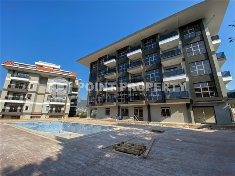 Apartment with an area of 60 m² in a new premium residence in Oba, Alanya.-id-2268-photo-18