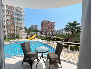 Furnished three-room apartment with mountain views in Alanya Tosmur-id-1189-photo-1