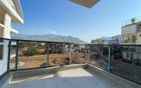 Apartment with an area of 60 m² in a new premium residence in Oba, Alanya.-id-2268-photo-21