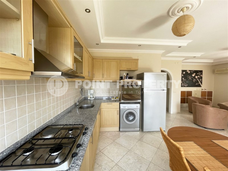 Меблированная трехкомнатная квартира с видом на горы в районе Алании Тосмур-id-1189-фото-11