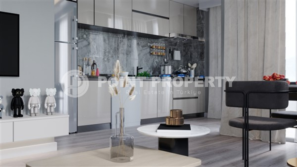 Двухкомнатная квартира, 52м² в комплексе на этапе строительства, в центре Алании, 250м до моря-id-2275-фото-13