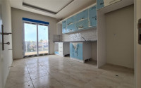 Three-room apartment, 100m², in an urban building under construction in the Gazipasa area, Alanya-id-2277-photo-3