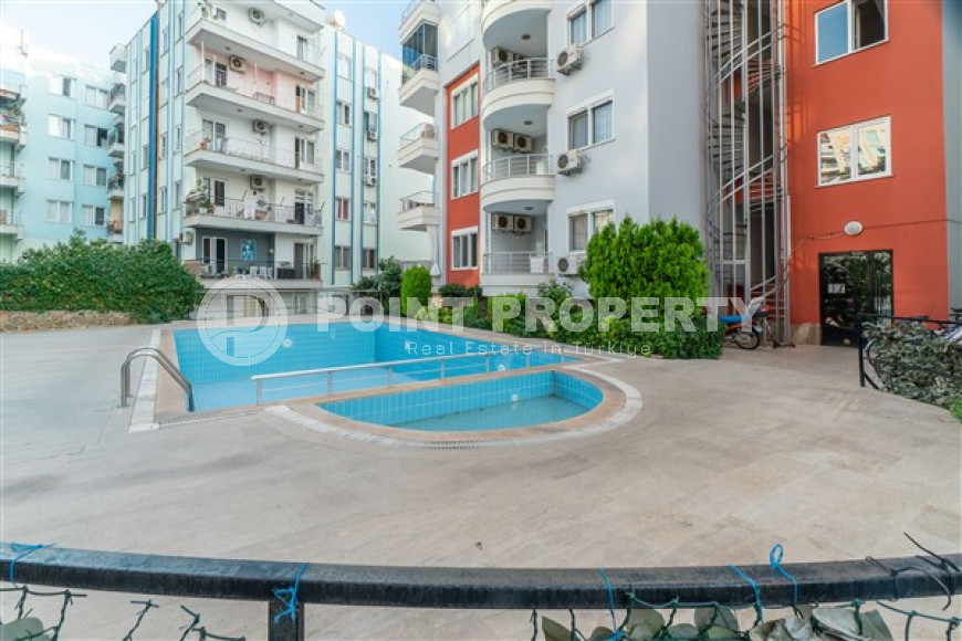 Меблированная квартира с двумя спальнями, 110м² в 100м от моря в районе Тосмур, Алания-id-2283-фото-3