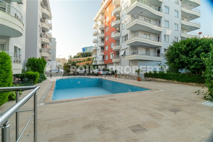 Меблированная квартира с двумя спальнями, 110м² в 100м от моря в районе Тосмур, Алания-id-2283-фото-5