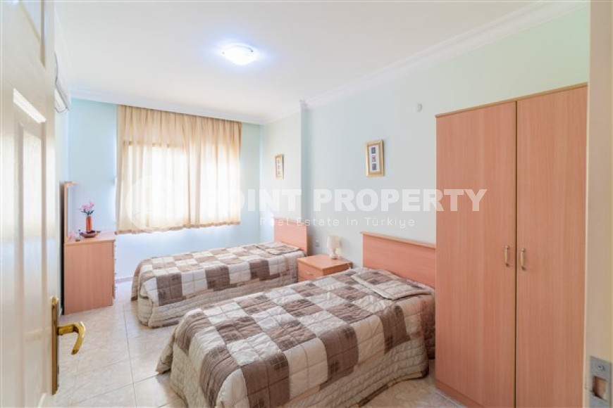 Меблированная квартира с двумя спальнями, 110м² в 100м от моря в районе Тосмур, Алания-id-2283-фото-10