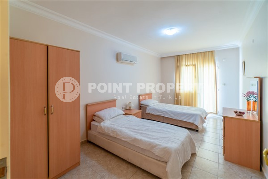 Меблированная квартира с двумя спальнями, 110м² в 100м от моря в районе Тосмур, Алания-id-2283-фото-13