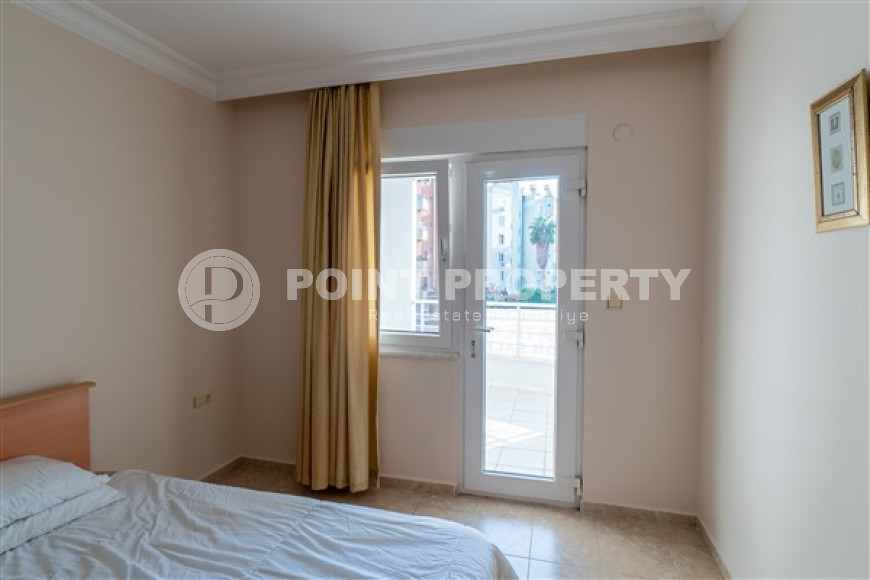 Меблированная квартира с двумя спальнями, 110м² в 100м от моря в районе Тосмур, Алания-id-2283-фото-14