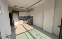 Laconic apartment with 1+1 in a new residential building in Upper Oba, Alanya-id-2288-photo-2