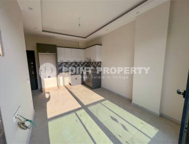 Laconic apartment with 1+1 in a new residential building in Upper Oba, Alanya-id-2288-photo-2