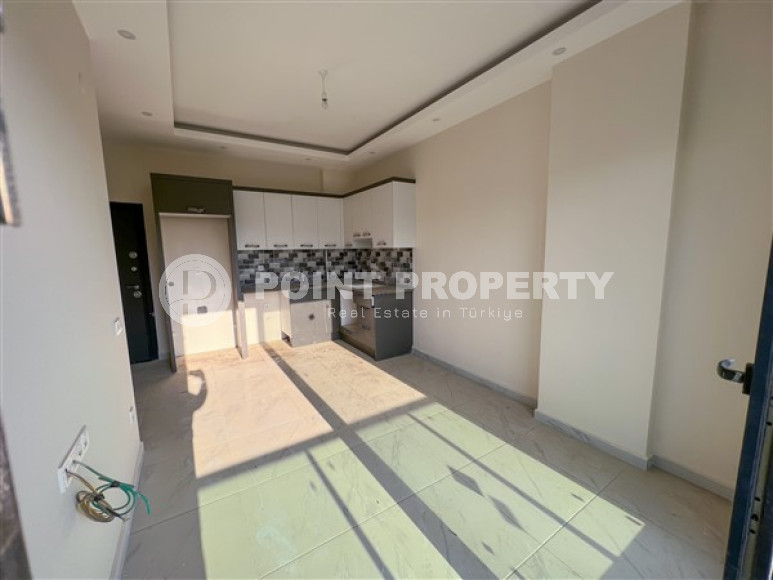 Laconic apartment with 1+1 in a new residential building in Upper Oba, Alanya-id-2288-photo-2