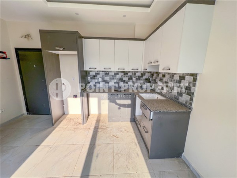 Laconic apartment with 1+1 in a new residential building in Upper Oba, Alanya-id-2288-photo-3