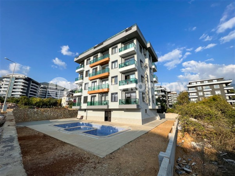 Laconic apartment with 1+1 in a new residential building in Upper Oba, Alanya-id-2288-photo-11