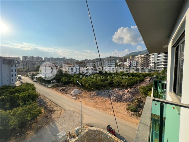 Laconic apartment with 1+1 in a new residential building in Upper Oba, Alanya-id-2288-photo-20
