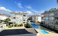 Spacious one-bedroom apartment in a residential complex in Lower Oba district, Alanya-id-2293-photo-1