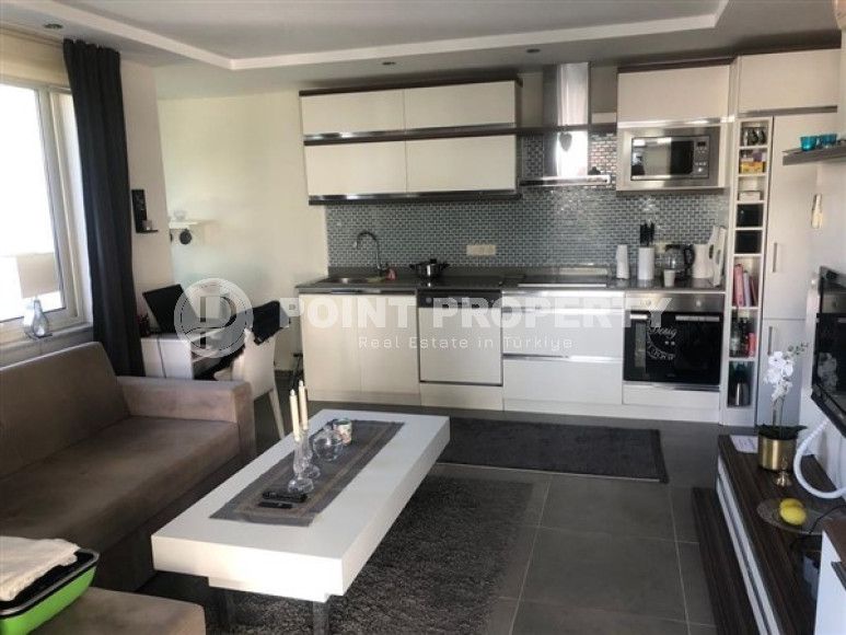 Просторная двухкомнатная квартира 1+1 60м2 в экологичном районе Алании Каргыджаке-id-2308-фото-3