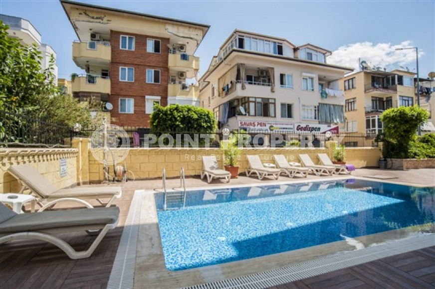 Трехкомнатная меблированная квартира, 90м² в уютном комплексе в 250м от моря в центре Алании-id-2311-фото-17