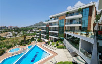 Ready to move in, 2+1 apartment in a comfortable complex in a residential area of Alanya - Cikcilli-id-1195-photo-1