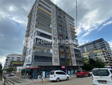 Стильная двухкомнатная квартира, 64м², в резиденции премиум класса в Махмутларе, Алания.-id-2322-фото-1
