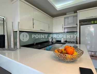 Стильная двухкомнатная квартира, 64м², в резиденции премиум класса в Махмутларе, Алания.-id-2322-фото-3