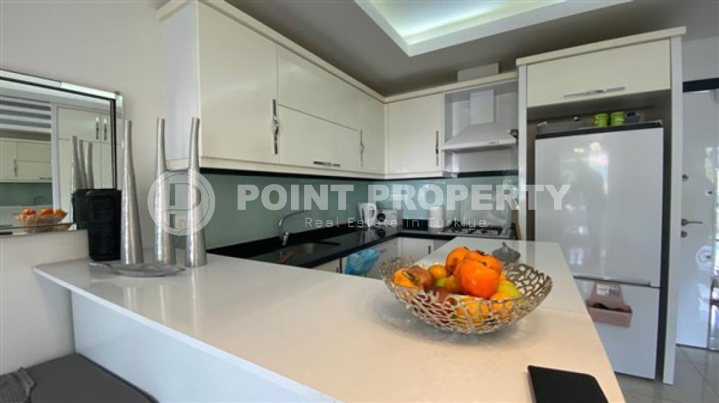 Стильная двухкомнатная квартира, 64м², в резиденции премиум класса в Махмутларе, Алания.-id-2322-фото-3