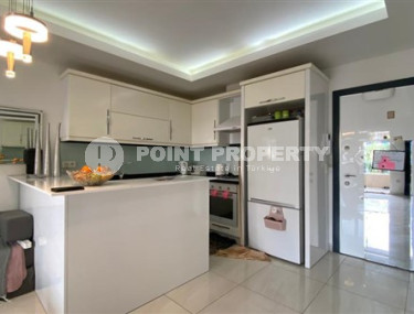 Стильная двухкомнатная квартира, 64м², в резиденции премиум класса в Махмутларе, Алания.-id-2322-фото-4