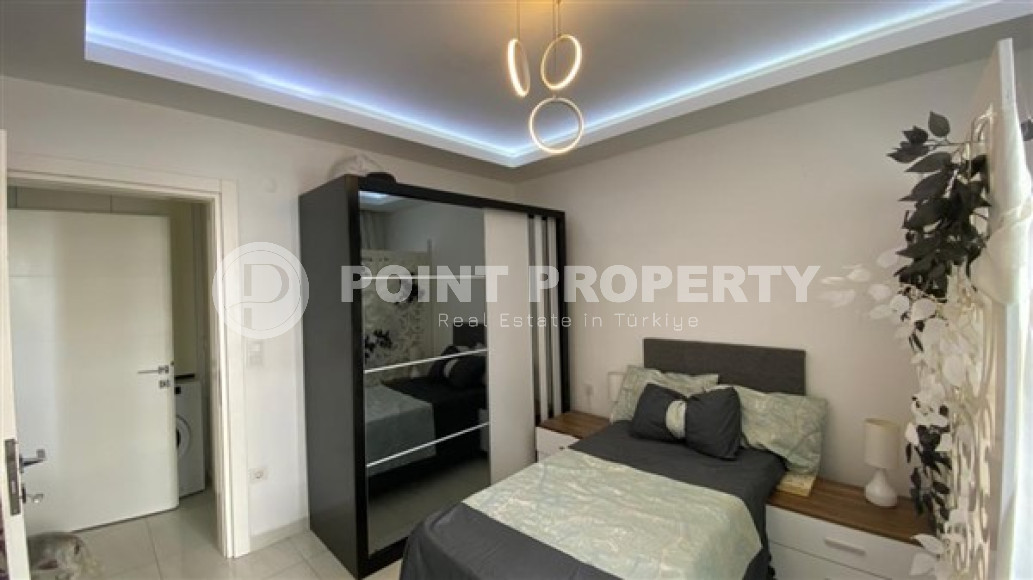 Стильная двухкомнатная квартира, 64м², в резиденции премиум класса в Махмутларе, Алания.-id-2322-фото-14