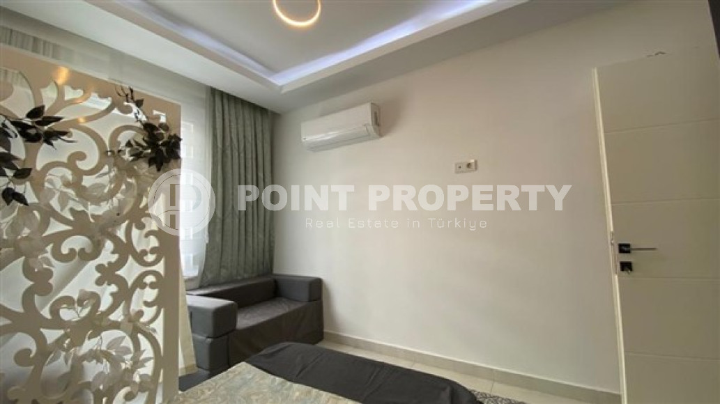 Стильная двухкомнатная квартира, 64м², в резиденции премиум класса в Махмутларе, Алания.-id-2322-фото-16