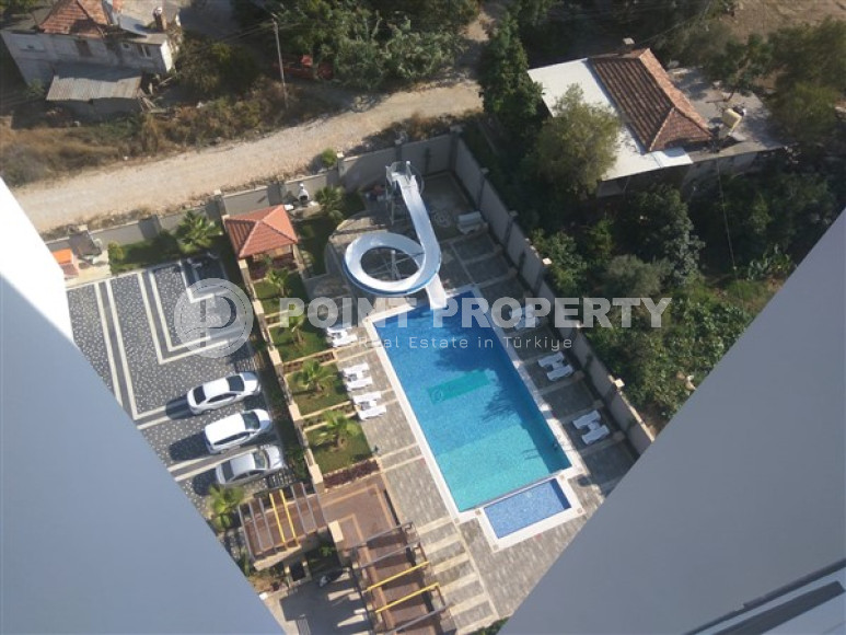 Стильная двухкомнатная квартира, 64м², в резиденции премиум класса в Махмутларе, Алания.-id-2322-фото-20