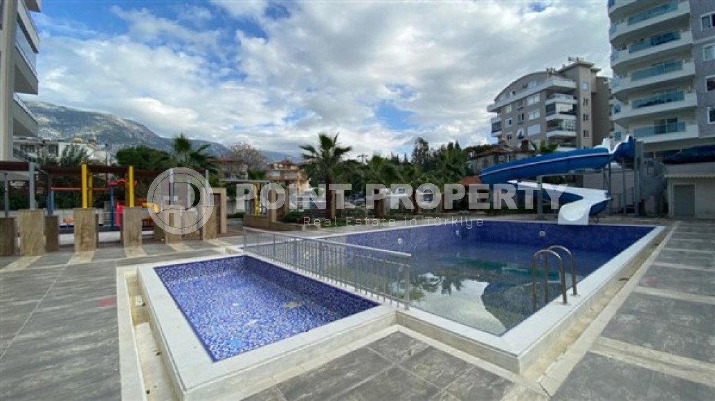 Стильная двухкомнатная квартира, 64м², в резиденции премиум класса в Махмутларе, Алания.-id-2322-фото-35