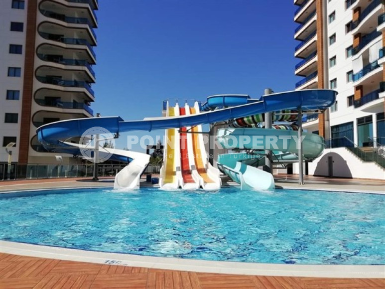 Furnished one-bedroom apartment in an elite complex at the foot of the Taurus Mountains in Mahmutlar-id-1196-photo-2