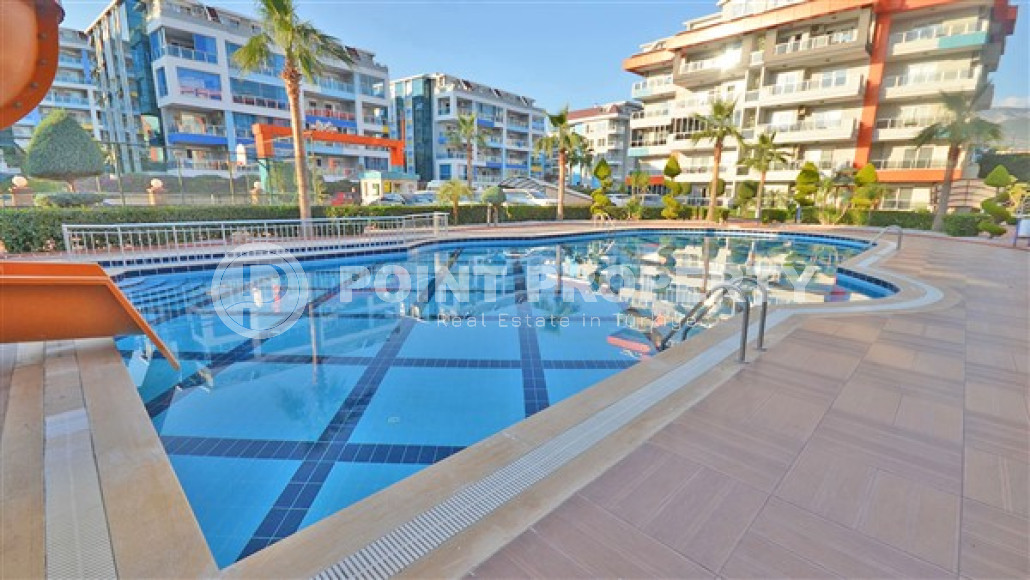 Уютная двухкомнатная квартира, 75м² в комплексе с инфраструктурой пятизвёздочного отеля в Кестеле, Алания-id-2325-фото-11