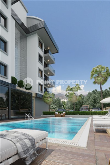 Апартаменты в комплексе премиум класса на этапе строительства в 400м от моря в районе Каргыджак-id-2330-фото-8