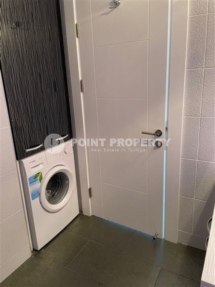 Furnished one-bedroom apartment in an elite complex at the foot of the Taurus Mountains in Mahmutlar-id-1196-photo-12