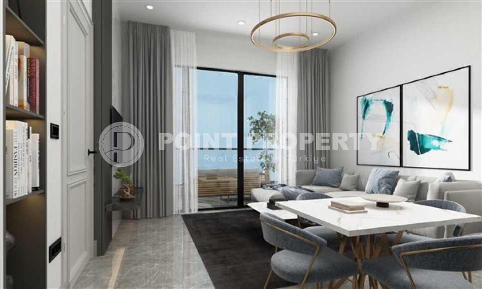 Апартаменты в комплексе премиум класса на этапе строительства в 400м от моря в районе Каргыджак-id-2330-фото-21