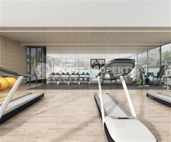 Апартаменты в комплексе премиум класса на этапе строительства в 400м от моря в районе Каргыджак-id-2330-фото-30