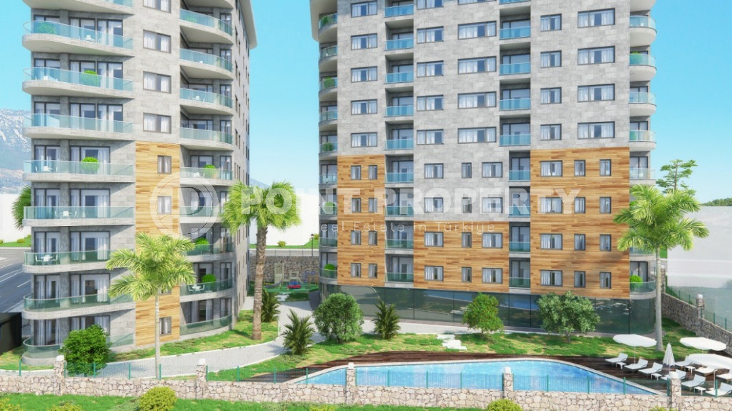 Apartment with sea and mountain views in the heart of Alanya, 650 meters from Cleopatra Beach.-id-1018-photo-1