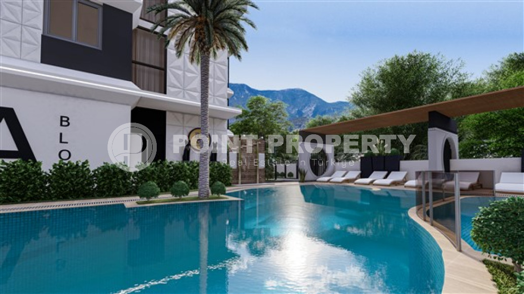 Двухкомнатные и трехкомнатные квартиры, 44-84м², в новом комплексе в Махмутларе, 750м от моря-id-2333-фото-8