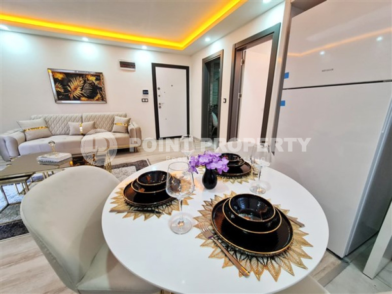 Apartment 1+1 in an elite residence with an area of 67 m², 350 m from the sea in Mahmutlar, Alanya-id-2335-photo-3