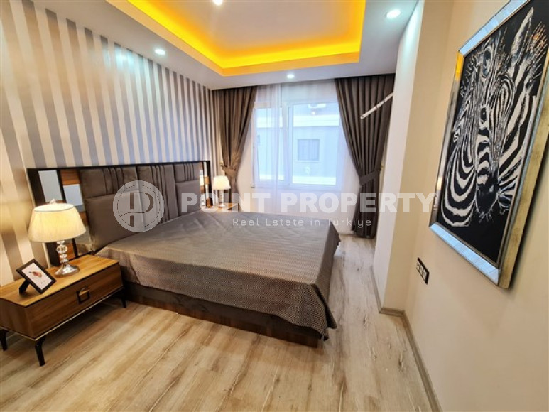 Apartment 1+1 in an elite residence with an area of 67 m², 350 m from the sea in Mahmutlar, Alanya-id-2335-photo-4