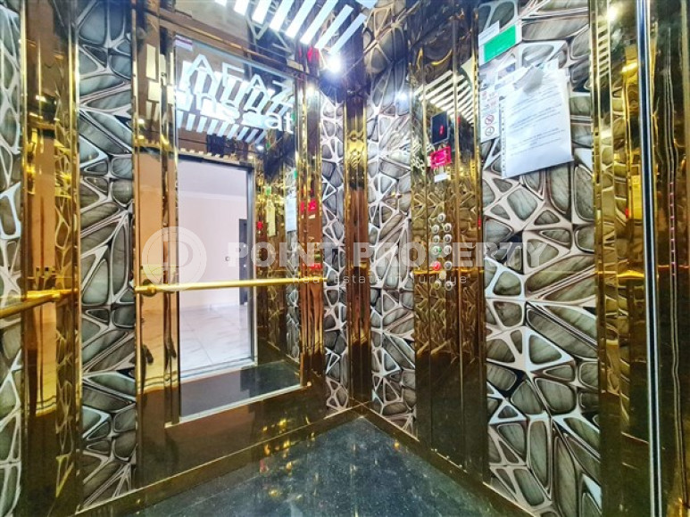 Apartment 1+1 in an elite residence with an area of 67 m², 350 m from the sea in Mahmutlar, Alanya-id-2335-photo-9