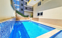 Apartment 1+1 in an elite residence with an area of 67 m², 350 m from the sea in Mahmutlar, Alanya-id-2335-photo-12