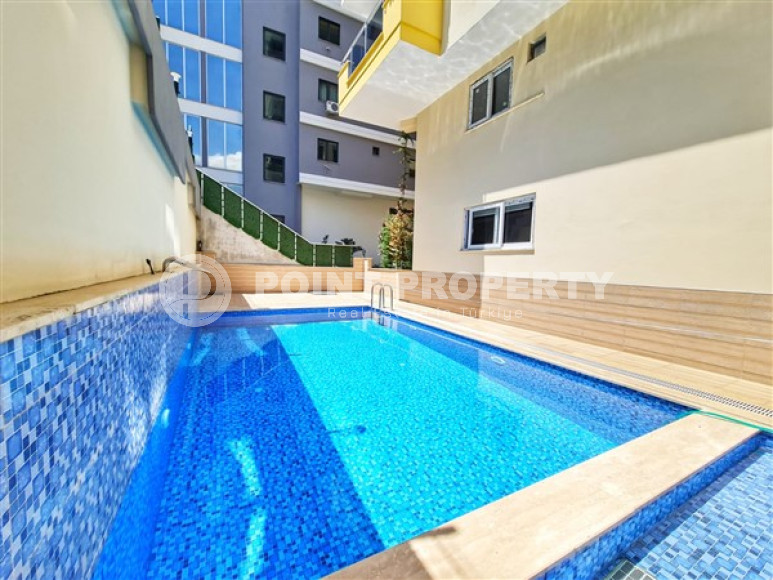 Apartment 1+1 in an elite residence with an area of 67 m², 350 m from the sea in Mahmutlar, Alanya-id-2335-photo-12