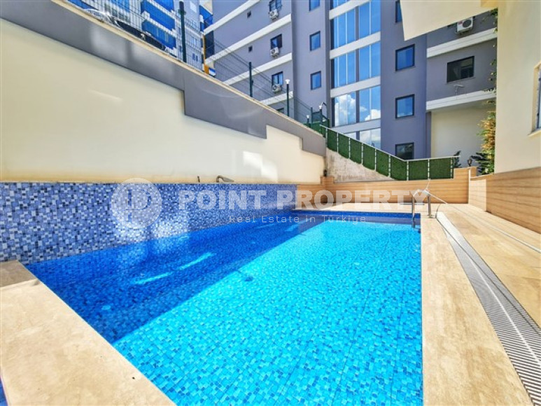 Apartment 1+1 in an elite residence with an area of 67 m², 350 m from the sea in Mahmutlar, Alanya-id-2335-photo-13