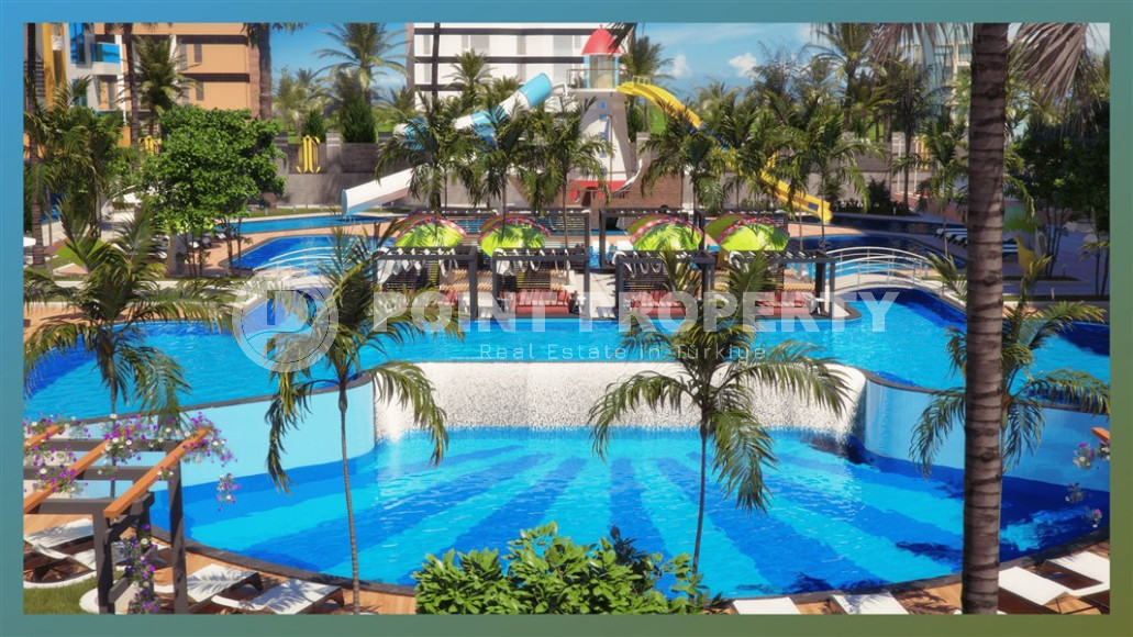 Luxury real estate: 1+1 apartment in a complex under construction with hotel infrastructure on the first coastline in Mahmutlar-id-1198-photo-2