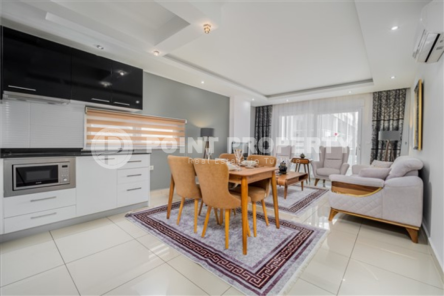 Апартаменты с двумя спальнями, 100 м², в комплексе с отельной инфраструктурой в Джикджили, Аланья-id-2343-фото-4